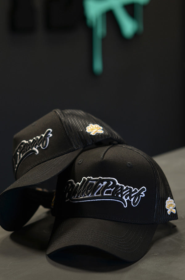 BLACK TRUCKER CAP - BLACK AND GOLD DETAIL