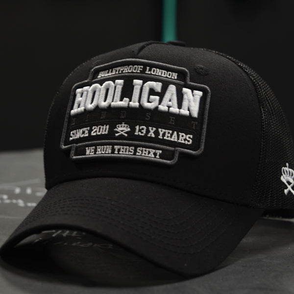 HOOLIGAN TRUCKER CAP - GREY AND WHITE DETAIL.